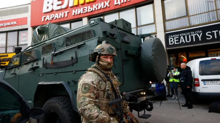 At least six killed in Kyiv as gunman opens fire and takes hostages
